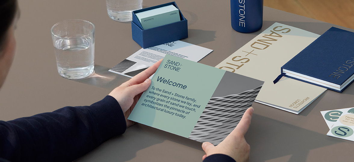 Person opening welcome kit.