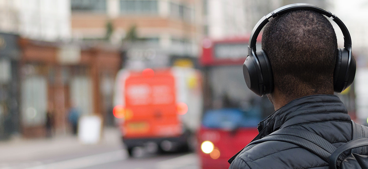 Person with headphones on the street