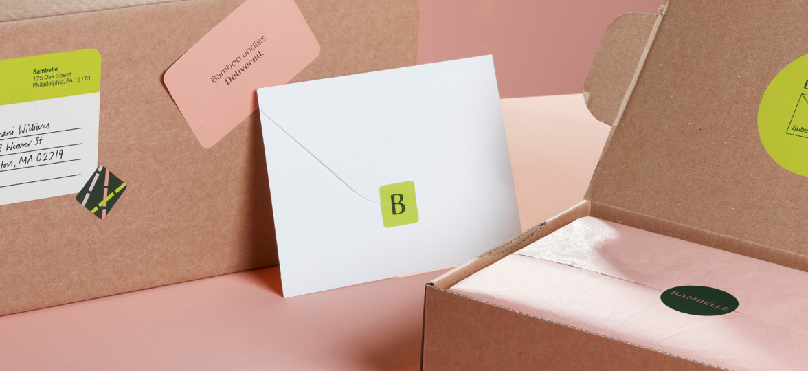 Boxes and envelopes with custom stickers in various sizes and designs