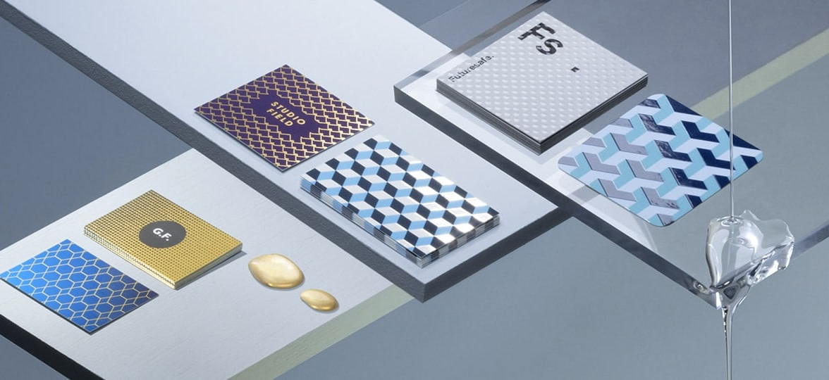 Business cards in various designs with special finishes including gold foil and spot gloss