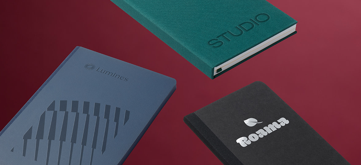 Three branded MOO notebooks.