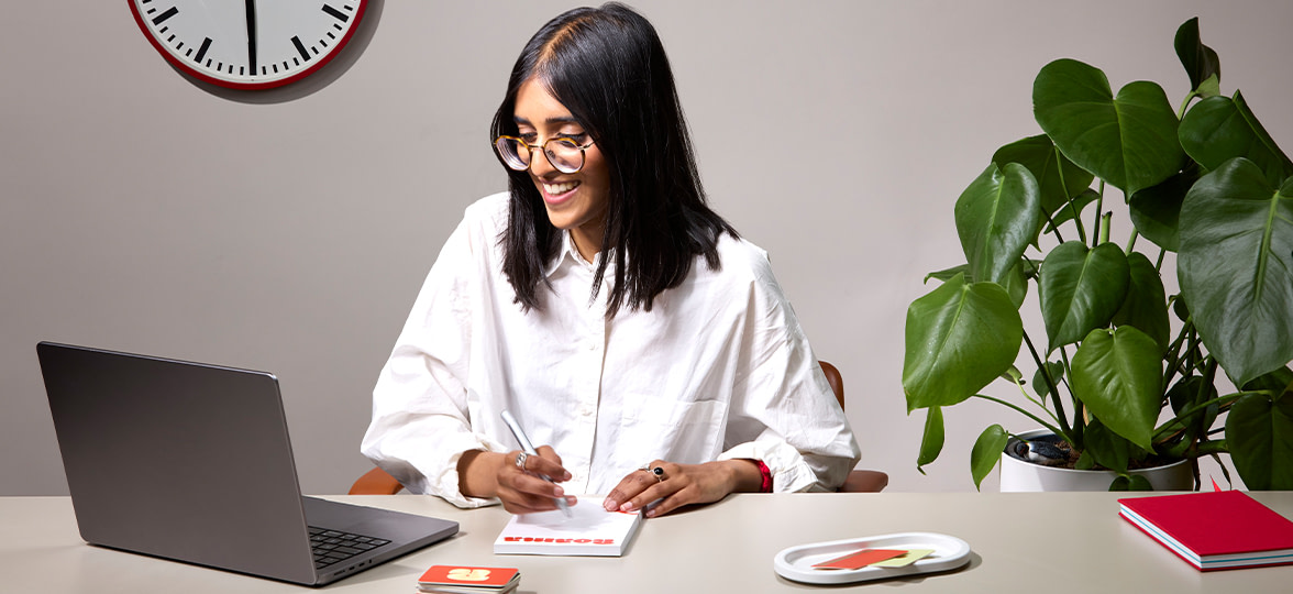 A woman using her notepad from MOO