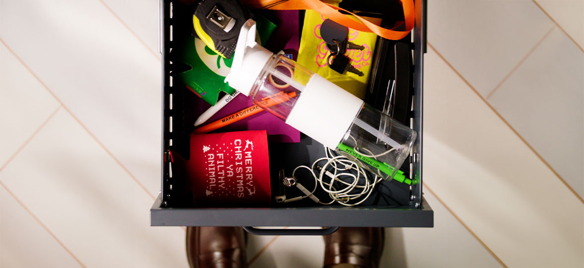 Drawer of shit merch.