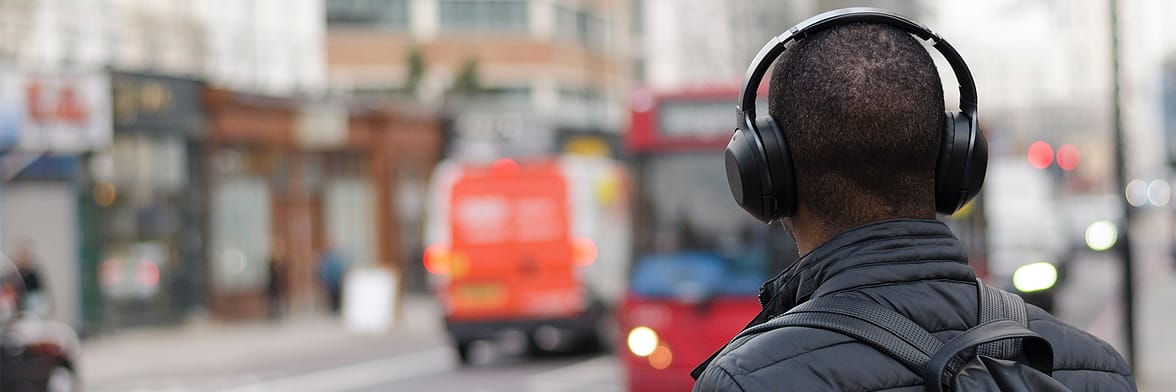 Person with headphones on the street