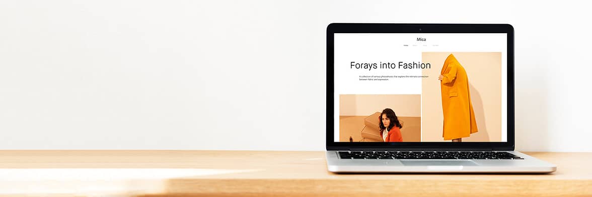 Fashion photography website on laptop