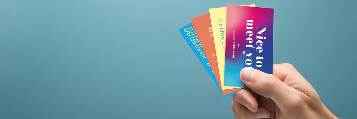 colorful business cards in hand