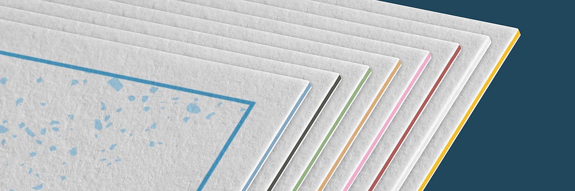 Close-up of Luxe extra thick postcards with eight different color seams