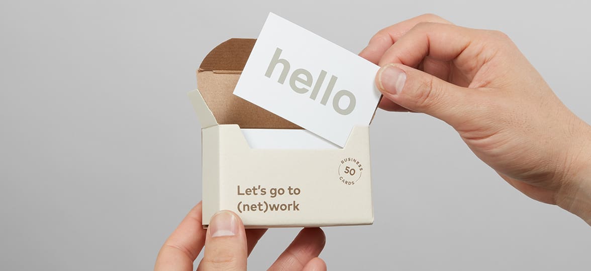 Business Cards with 'Hello' written on, in sustainable packaging from MOO