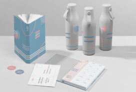 A full suite of consistently branded brand assets, including a notebook, water bottles, flyers, and stickers.