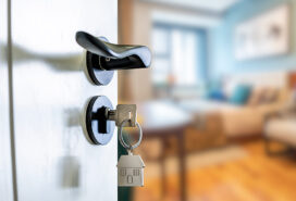 Opening the door with the keys to your new home