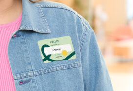 Person with sticker name tag.