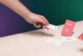 hands holding mini cards