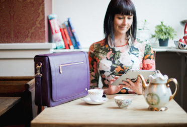 Jennifer Hamley holding one of her bags