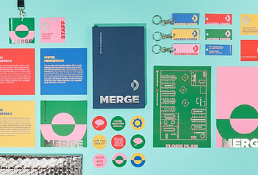 Suite of custom print products in various colors and sizes including stickers, flyers and postcards with special finishes