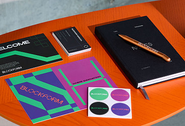 The elements of a welcome kit inspired by MOO's Welcome Box