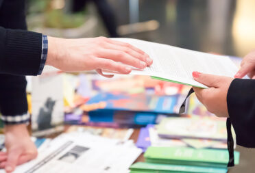 Trade show marketing in action, an interaction between exhibitor and delegate