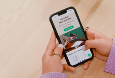 Our new platform for custom branded merch being used on a phone.