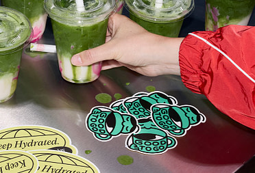 Green branded Stickers and Matcha