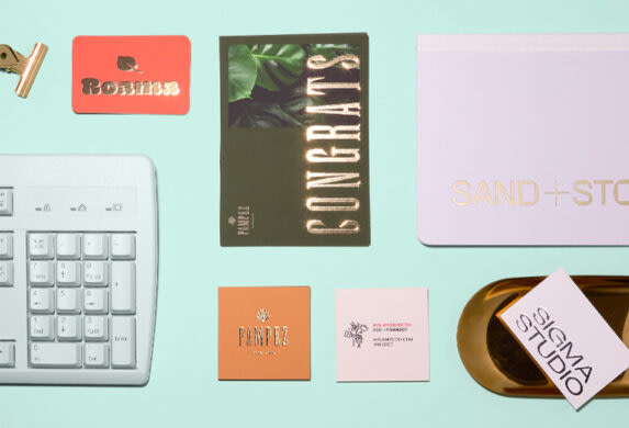 A variety of MOO print products including a notebook, business cards and flyers