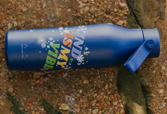 Blue reusable water bottle by Kitty and Vibe and MOO