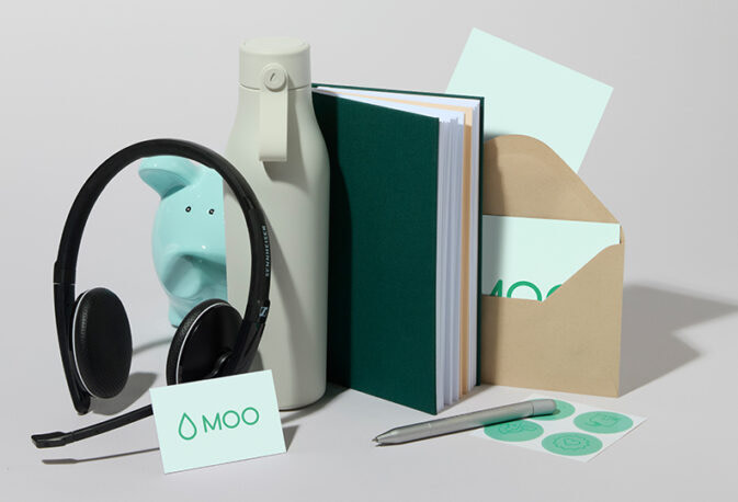 Notebook, Water Bottle, Headphones and MOO print.