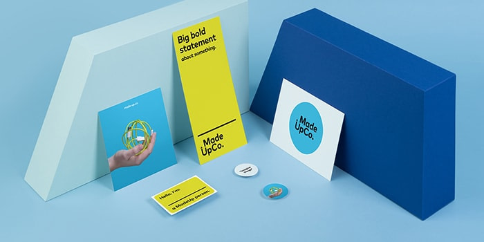 Set of print collaterals including stickers and postcards for a made up company