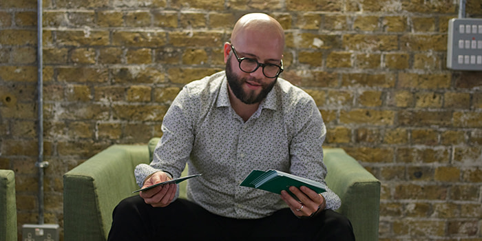 Federico Franceschetti looking at cards