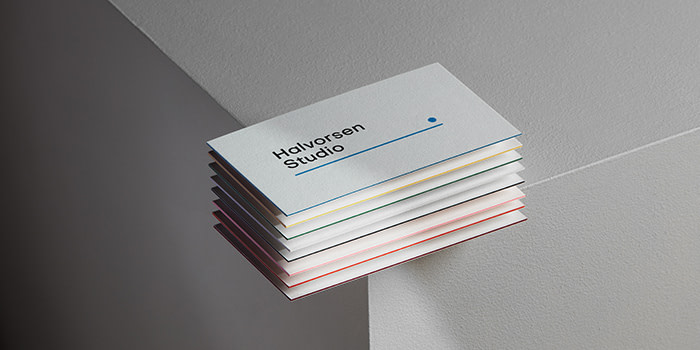 MOO Luxe business cards shot on a table to show luxury quality of paper