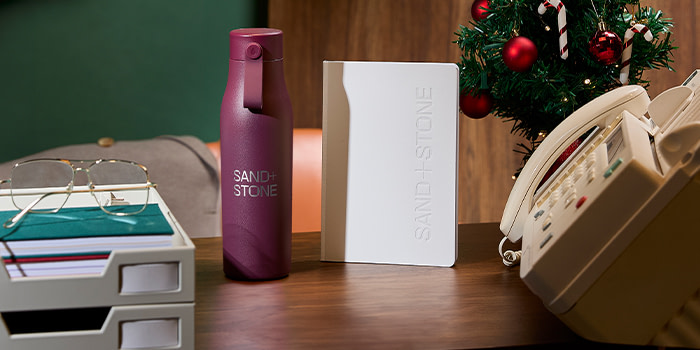 MOO Water Bottle and Tapebound Noetebook.