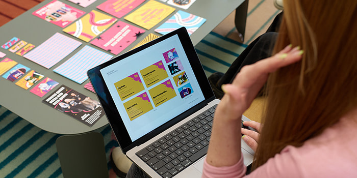 Queer Brewing Business Cards being presented to the client on a laptop screen