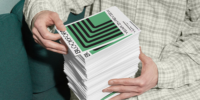 Eco paper Flyers being held by person.