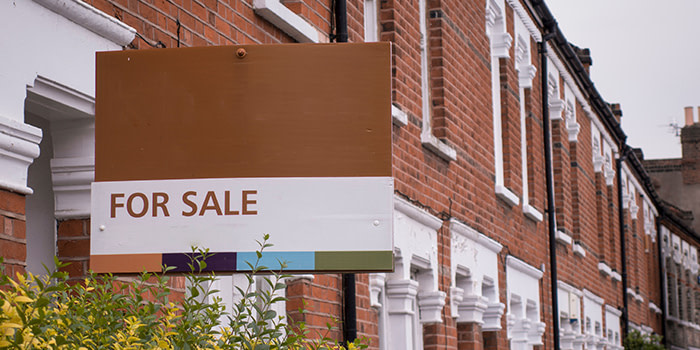 A for sale sign on a newly listed property