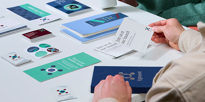 Branded Merchandise and Print Products on table.