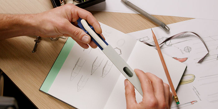 Felix showing an early prototype of the pen.