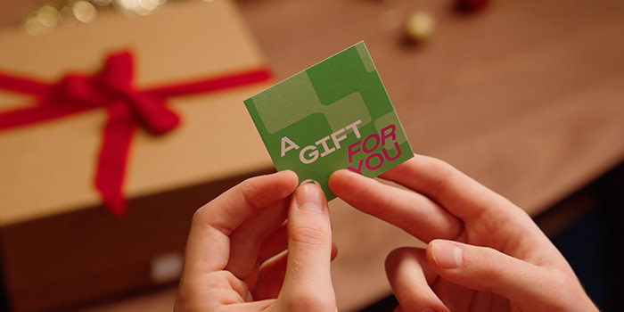 A square Business Card that says "a gift for you"