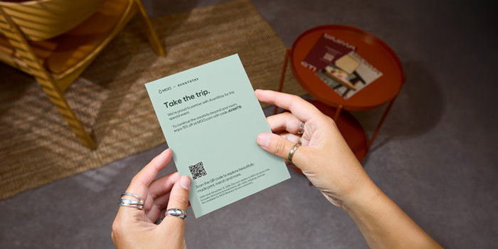 Someone holding a MOO insert in their hands.