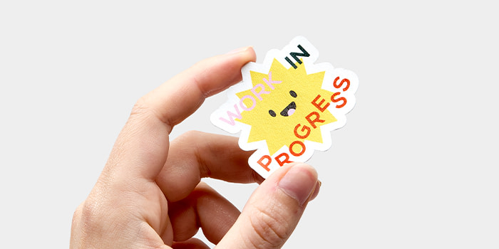 A Die Cut Sticker saying "Work in Progress"