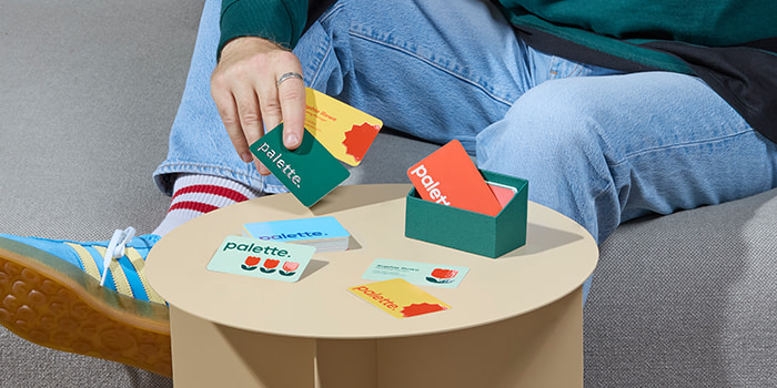 Person holding multiple Business Cards.