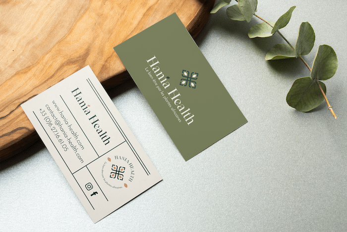Green business cards designed by Roubina Tacorie for Hania Health