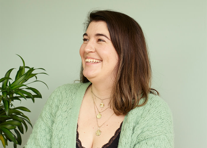 A customer service professional talking about mental health at work during Stress Awareness Month