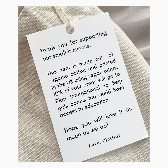 Rue Clotilde hang tag explaining the sustainable production process