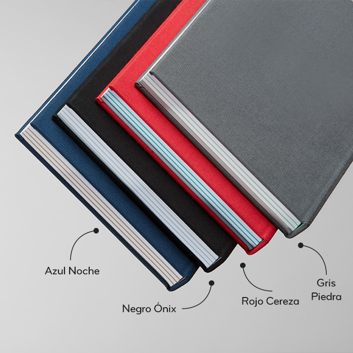 Showing the colors of our branded planner: Midnight blue, Jet Black, Berry Red and Charcoal Red.