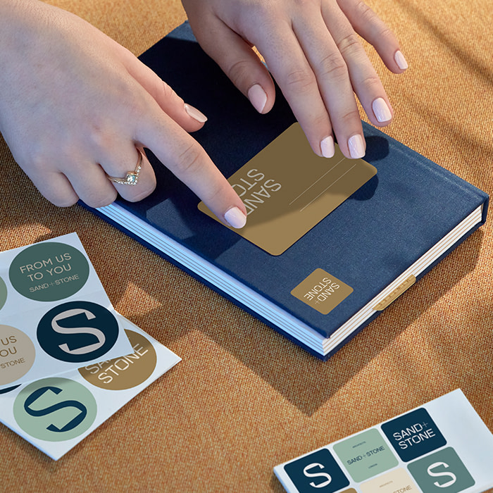 Sticker being used as an organizational tool alongside a MOO Perpetual Planner