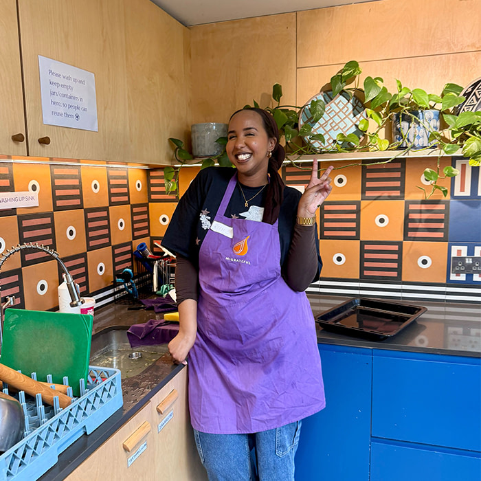 Riam volunteering in Migrateful.