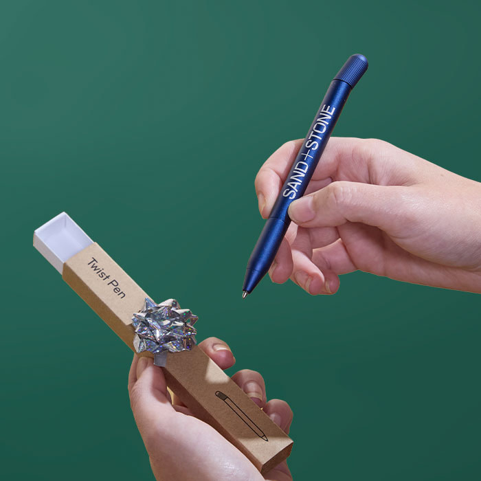 Someone holding a twist pen.