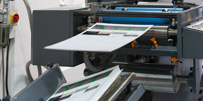 MOO printer printing test paper sheets