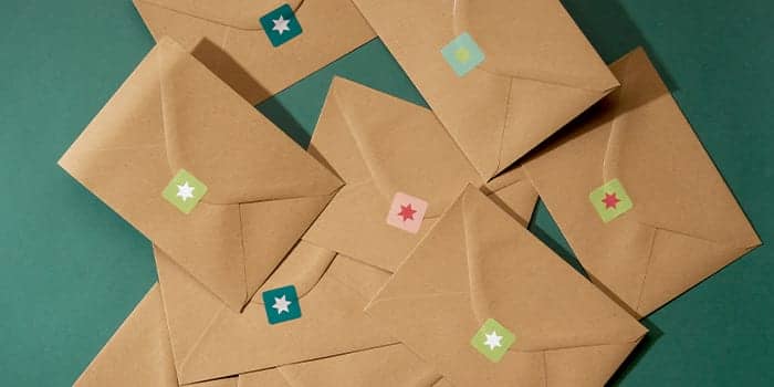 Brown envelopes sealed by mini square stickers with a star design