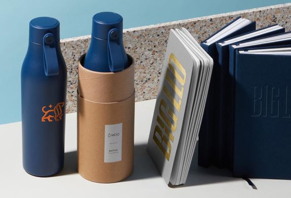 Big Leo water bottles and custom notebooks