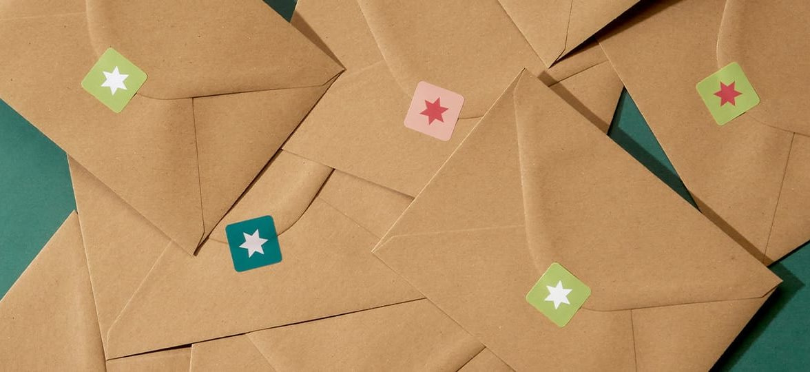 Brown envelopes sealed by mini square stickers with a star design