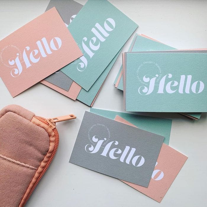 Jodie Newman hello business cards in blue, grey and pink